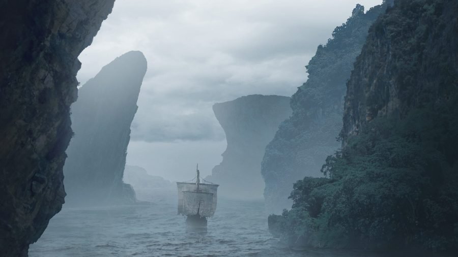 Sheer cliffs rising out of an uncharted sea.